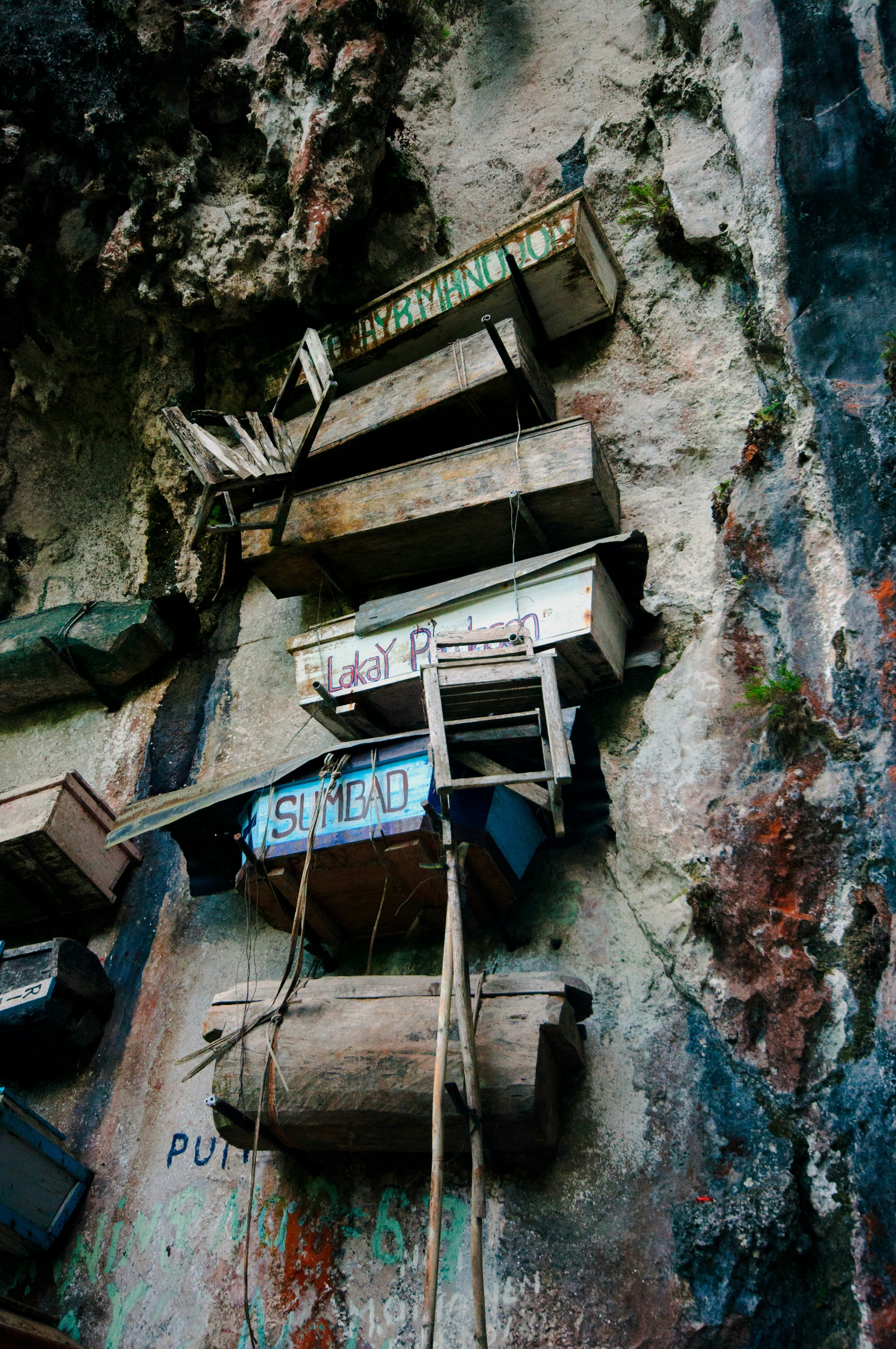 white and blue wooden ladder